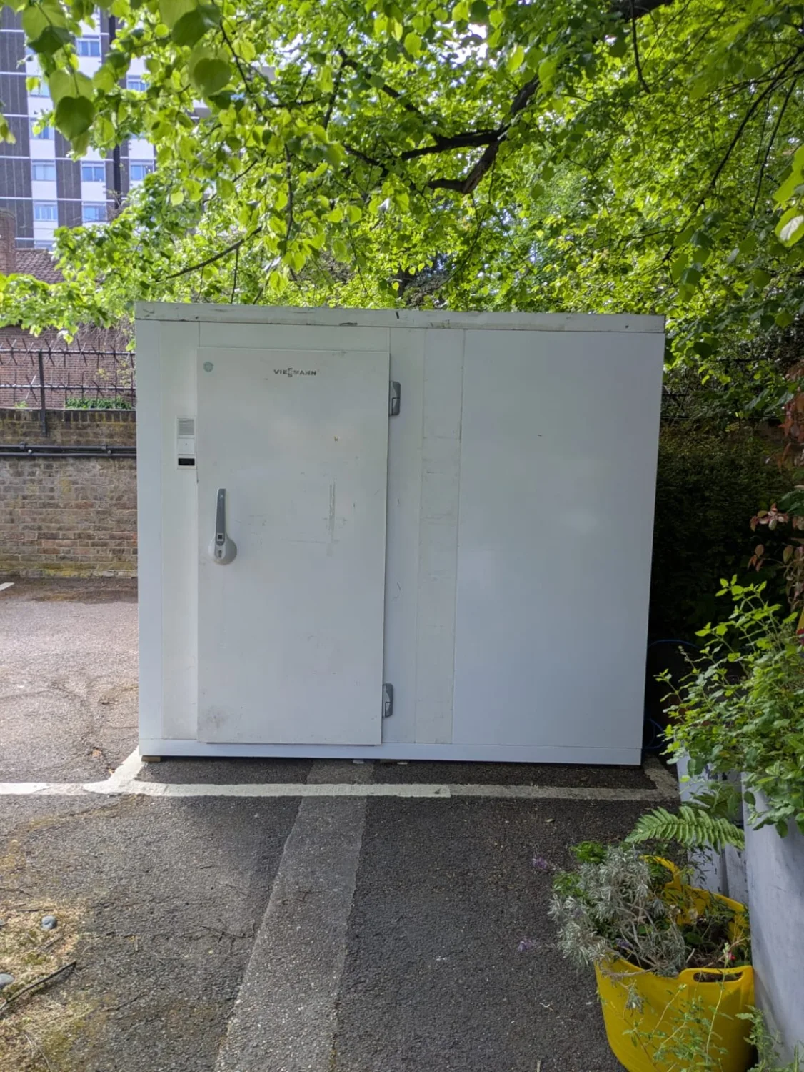 VCS temporary walk-in cold room installed in a paved outdoor courtyard